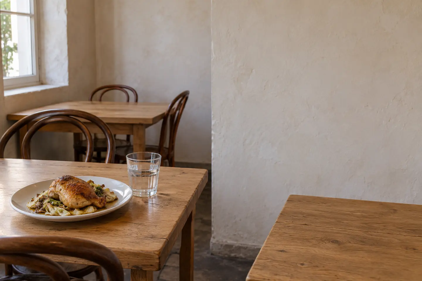 A modest fictional bistro dining room.
